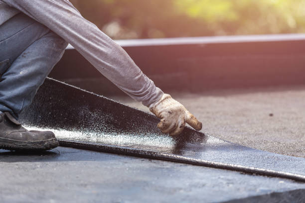 Professional Waterproofing technician working in Perry, MI